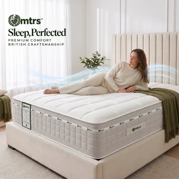 Woman lying on her side on the MTRS Hybrid Dynamics 3000 medium mattress